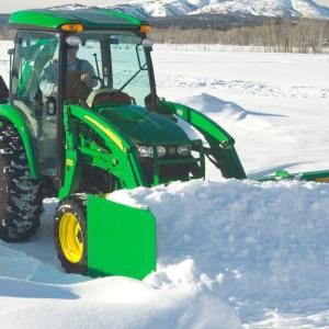 field image of as11e series snow push on a tractor in the snow