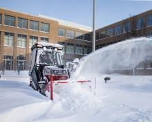 Ventrac tractor with snow removal attachments