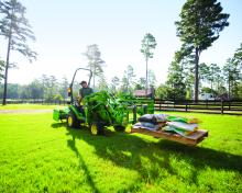 John Deere 1023E Compact Tractor with Attachments